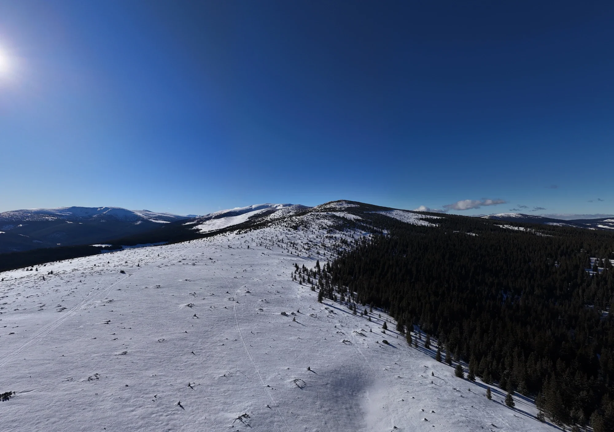 Panoramic drone view of Vârful Cindrel in winter, Cindrel Mountains, Romania